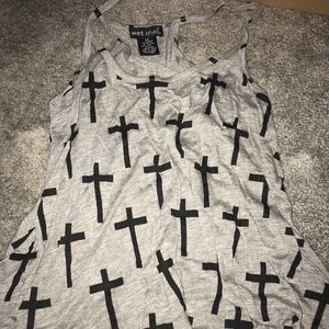 Tank top with crosses on it.